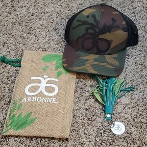 Arbonne grab bag items camo trucker hat